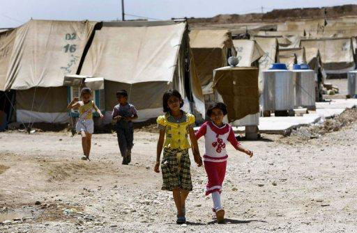 Hundreds of Syrian refugees fled to Iraq since President Bashar Al-Assad’s crackdown began last year