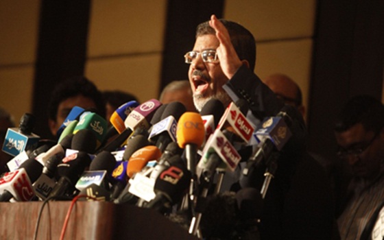 Mohamed Morsi, FJP Chairman and presidential candidate addresses a meeting of coalition partners against SCAF rule (AFP)