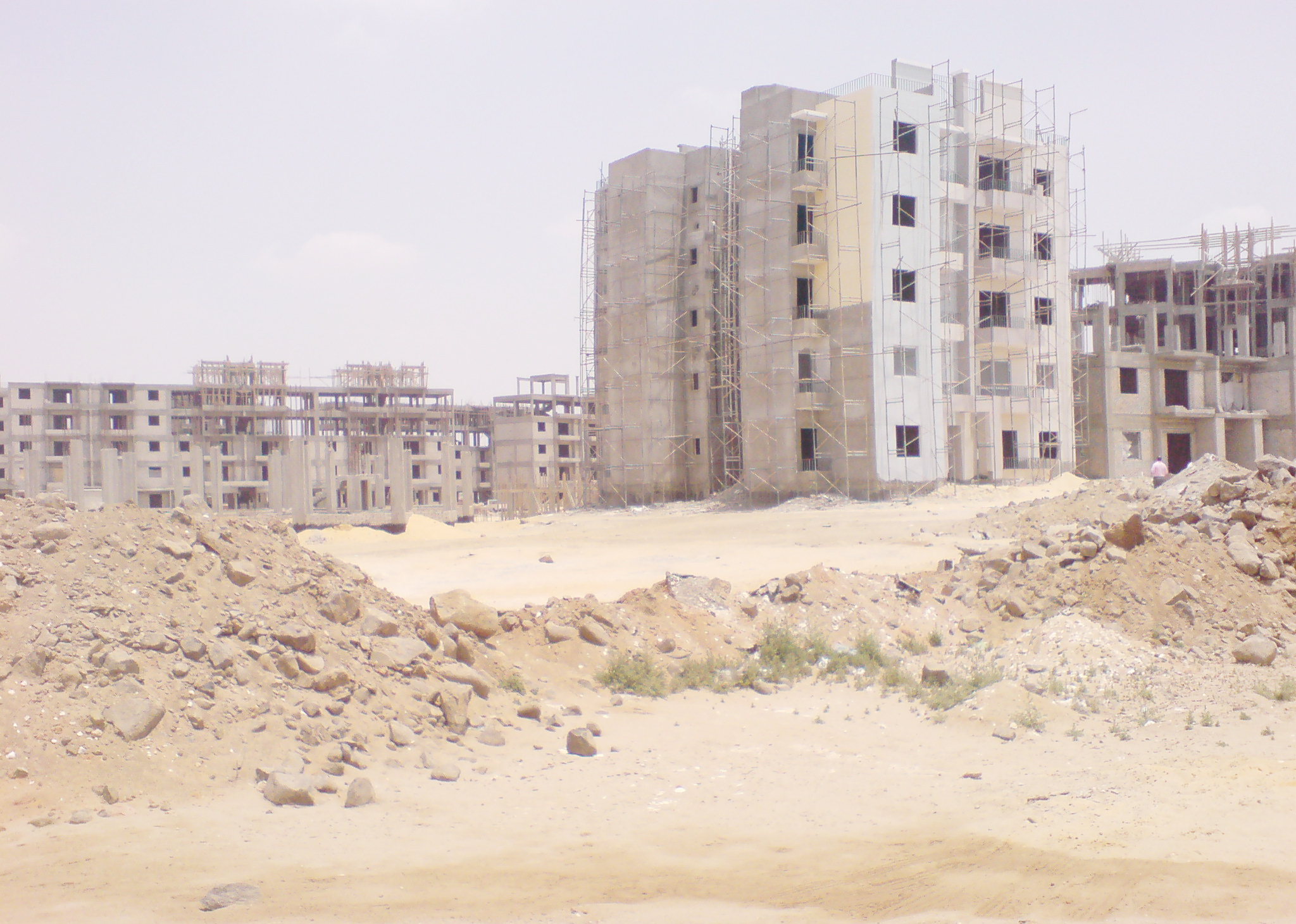 The Ministry of Housing froze all standing housing projects, including the second phase of a plan to build one million units and another Central Agency for Construction plan for 50,000 units in the provinces