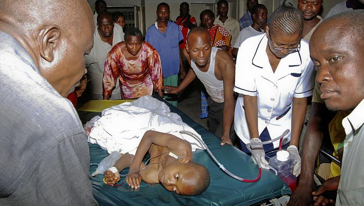 A child injured by an explosion at a bar in the Mishomoroni district of Mombasa. AFP Photo