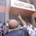 Protesters outside the Administrative court in Cairo wait for a Court ruling on the panel of Judges designated to decide on the legitimacy of the constitutional committee on 30 July in Cairo (photo: The Daily News Egypt/ Mohamed Omar)