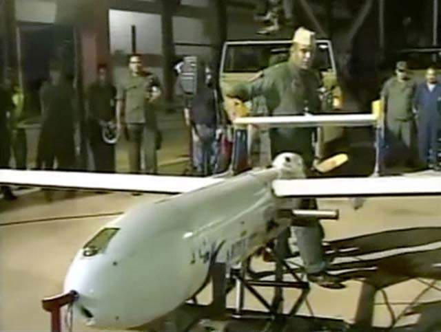 A screengrab from a video released by the Venezuelan Ministry of Defense shows President Hugo Chavez inaugurating Iranian made "Mohajer 2" drones