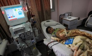 The Gaza city hospital that provides this boy with dialysis will soon be relying on Egypt's energy grid for their shortages, despite shortfalls there as well (photo: AFP)