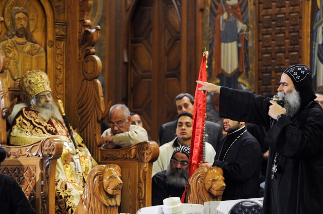 Body of Coptic Christian Pope Shenouda III lies in state at St Marks cathedral in Cairo as worshippers walk past to pay their final respects (File photo: Laurence Underhill)