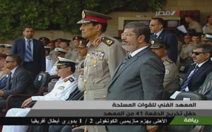 President Mohamed Morsy shared a dais with the two heads of the Supreme Council of Armed Forces at the  graduation ceremony for the Military Technical College
