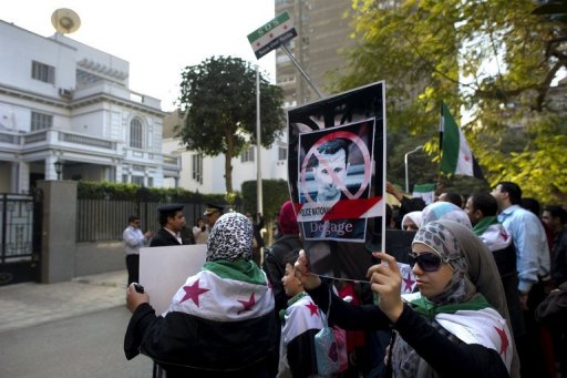Protesters outside the Syrian embassy in Cairo plan to continue to pressure against the government in Syria (photo AFP/ODD ANDERSEN)