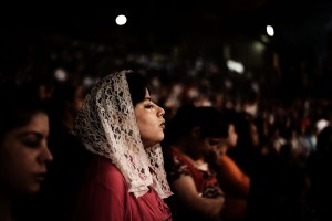Worshippers attend a service at the St Samaans (Simon) Church also known as the Cave Church in the Mokattam village in Cairo (file photo: AFP PHOTO/GIANLUIGI GUERCIA)