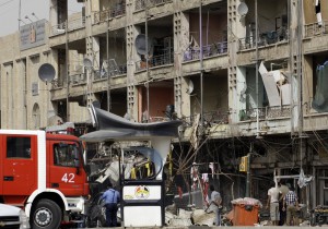 A fire engine arrives at the scene as Iraqi security gather following twin car bombs in the Karrada area of the capital Baghdad (Photo: AFP/Ali Al-Saadi)