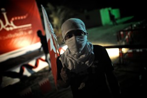       A Bahraini Shiite Muslim joins a demonstration in solidarity with jailed Bahraini human rights and political activists in the village of Sitra, south of Manama, in the early hours of 14 August  AFP PHOTO/MOHAMMED AL-SHAIKH 