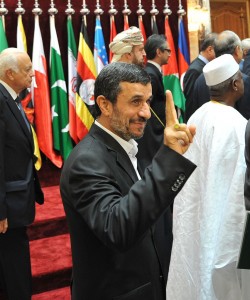 Iranian President Mahmoud Ahmadinejad, pictured here flahes at the summit of the Organisation of the Islamic Conference in Mecca, attended the unveiling of the upgraded missile systems  AFP PHOTO / FAYEZ NURELDINE