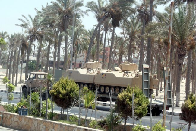 Egyptian military forces have been deployed across Sinai, with tanks, armoured personnel carriers and soldiers spread across the peninsula’s main and international roads. AFP / Stringer