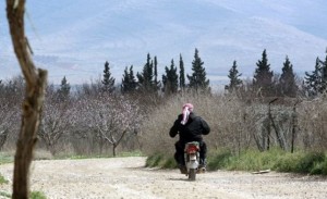 A man rides his motorbike in Joura in Lebanon's Bekaa valley in the area where the Kuwaiti engineer was allegedly kidnapped  AFP PHOTO