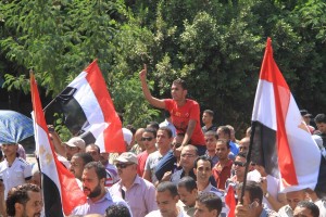 Protesters march towards the Ministry of the Interior building in Downtown Cairo on 24 August  Mohamed Omar