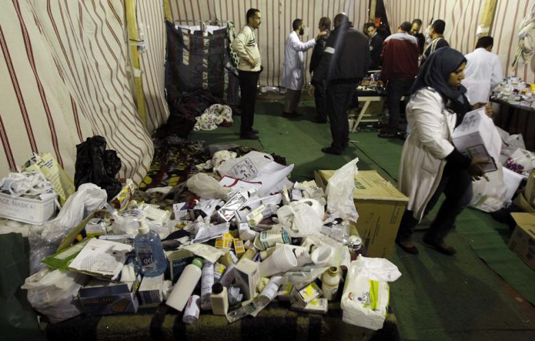 A makeshift hospital near Tahrir Square providing medical services to people injured in clashes near Mohamed Mahmoud street in 2011. Many of these practitioners feel that the security challenges they experienced during the uprising have followed them to the hospitals they work in today (file photo: AFP Mahmoud Hams)