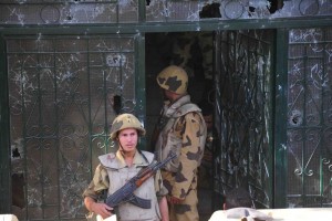 Egyptian Army soldiers secure the Israeli Embassy in Giza after it was stored by protesters in September 2011 Hassan Ibrahim