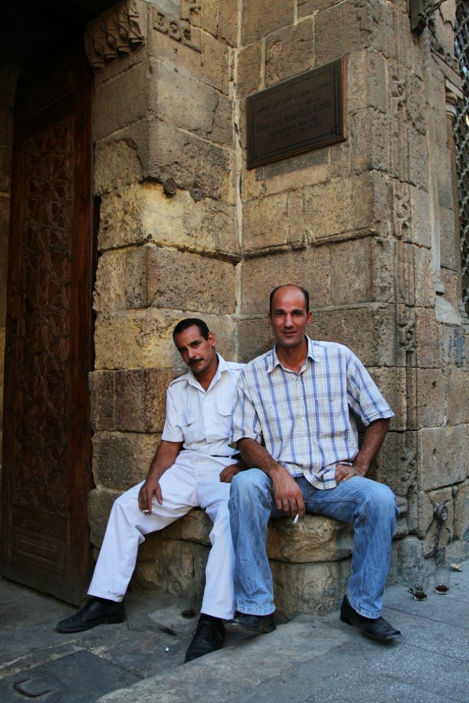 A tourist police officer and friend rest in Khan al Khalili Photo by Rachel Adams
