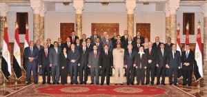   A handout image made available by the Egyptian presidency on August 2, 2012, shows Egyptian President Mohammed Morsy (8th L) following the swearing in ceremony of the new Egyptian cabinet at the presidential palace in Cairo (photo: AFP PHOTO/EGYPTIAN PRESIDENCY)