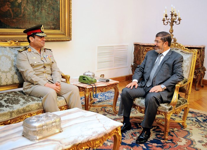 New Defence Minister Abdel Fattah al-Sissi (left) has continued to make new appointments to some of the top ranks in Egypt’s military, pictured here with President Mohamed Morsi at the presidential palace in Cairo on 13 August AFP PHOTO/HO/EGYPTIAN PRESIDENCY
