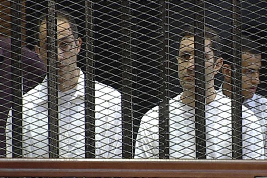 Gamal (left) and Alaa Mubarak during their trial in Cairo on 2 June 2012 (File photo) AFP