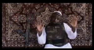 This undated image grab taken on 5 August from a video uploaded on YouTube purportedly shows Boko Haram leader Abubakar Shekau speaking in a 38-minute clip, would could not be independently verified as authentic, but it was similar to previous videos of Shekau  AFP PHOTO / YOUTUBE 