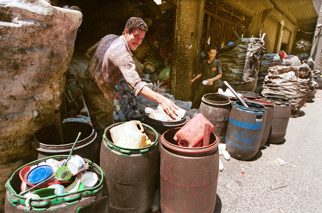 A member of the Zabaleen community sorting solid waste CID Consulting
