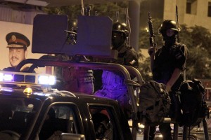 Jordanian police forces keep watch during an anti-government rally in Amman on 1 September, held to protest against proposed rises in gasoline prices AFP PHOTO/KHALIL MAZRAAWI 