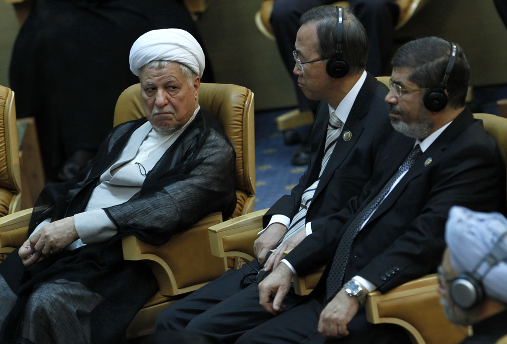 Egyptian President Mohamed Morsi (right), UN Secretary General Ban Ki-Moon (centre) and Iran's former president Akbar Hashemi attend the Non-Alligned Movement summit in Tehran AFP PHOTO / MEHR NEWS / RAOUF MOHSENI