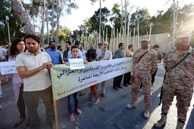 Libyans protest in Tripoli on 27 August to urge the newly-elected parliament to intervene to protect the national heritage after Islamist hardliners destroyed shrines across the country AFP PHOTO / MAHMUD TURKIA