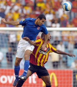 Abu Treika leaps up to head the ball (File photo)  AFP PHOTO