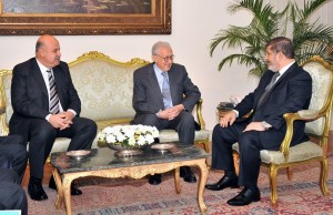 President Mohamed Morsi (right) and Vice President Mahamud Miki (left) meeting with UN and Arab League envoy for Syria, Lakhdar Brahimi, at the presidential palace in Cairo on 10 September  AFP PHOTO / HO / EGYPTIAN PRESIDENCY