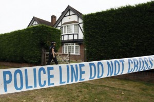 British police stand outside the home of Saad and Iqbal al-Hilli in Claygate, in Surrey, south-east England AFP PHOTO / JUSTIN TALLIS