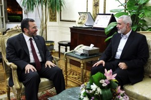 Ismail Haniya (right) head of the Hamas government in the Gaza Strip, meeting with Egyptian Premier Hisham Qandil in Cairo  AFP PHOTO / ISMAIL HANIYA'S OFFICE