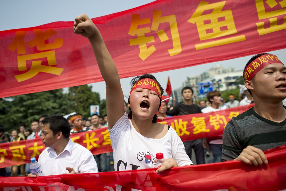 A Chinese demonstrator shouts slogans during a protest against Japan's "nationalising" of Diaoyu Islands, in Hangzhou, east China's Zhejiang province AFP PHOTO