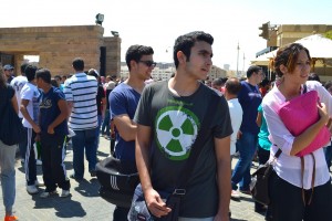 AUC students watch a protest at the university gates on 16 September  Wajih Fakhouri / The Caravan