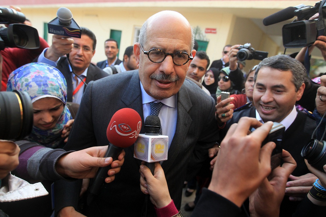 Mohamed ElBaradei, interim leader of the new Dostour party, leaves a polling station after voting in the 2011 parliamentary elections (File photo) AFP PHOTO / KHALED DESOUKI