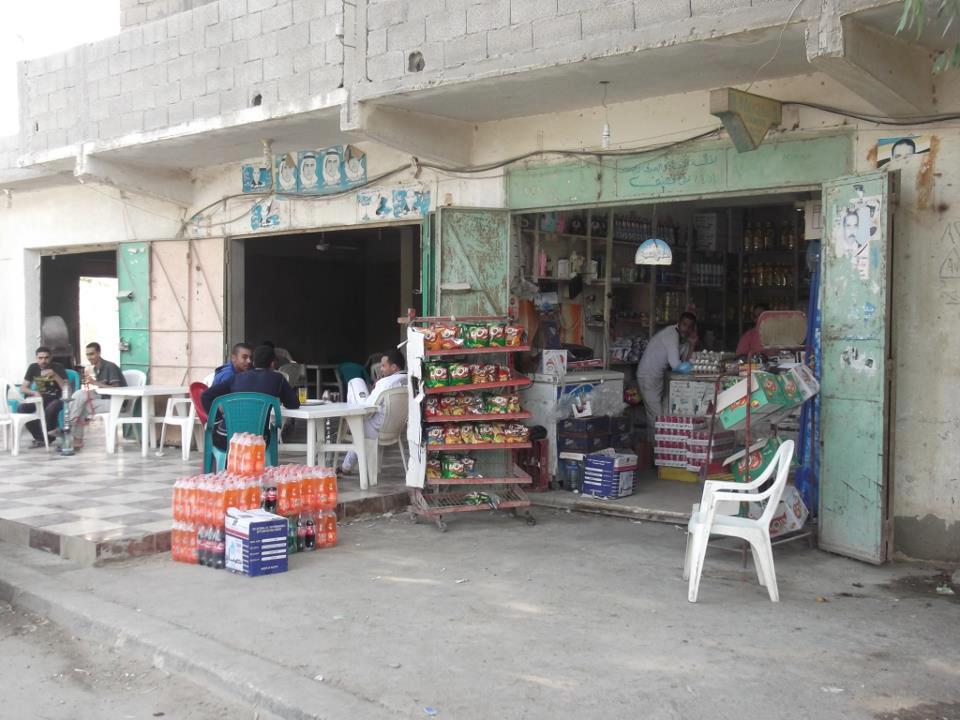 Mamdouh Nasif reopens his shop after it was shot at by gunmen Nasser El-Azazy