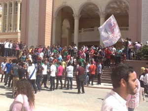 Students gather during a protest outside the British University in Cairo buildings  Omar Elalfy
