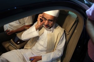Mohamed al-Megaryef speaks on his mobile phone ahead of visiting wounded Libyan security forces member at the Benghazi hospital on 14 September  AFP PHOTO / ABDULLAH DOMA