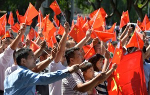 Chinese protester gestures as he marches during an anti-Japanese protest over the Diaoyu islands issue, known as the Senkaku islands in Japanese, outside the Japanese Embassy in Beijing  AFP PHOTO / GOH CHAI HIN 