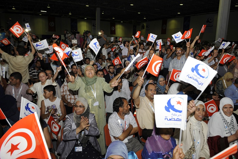 Ennahda party supporters cheer during a political rally (File photo) AFP PHOTO / FETHI BELAID