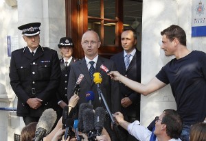 French police Colonel Marc de Tarle (centre) next to Surrey Police Assistant Chief Constable Rob Price (left) speaks to journalists outside Woking Police station, in south-east England, about the ongoing investigation following the shooting of a British family in the French Alps AFP PHOTO / JUSTIN TALLIS