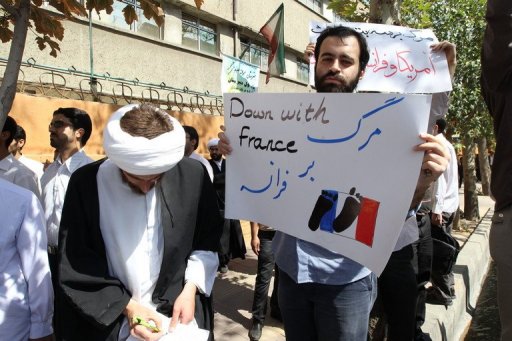 Iranians shout slogans during a demonstration outside the French embassy in Tehran AFP/File, Atta Kenare