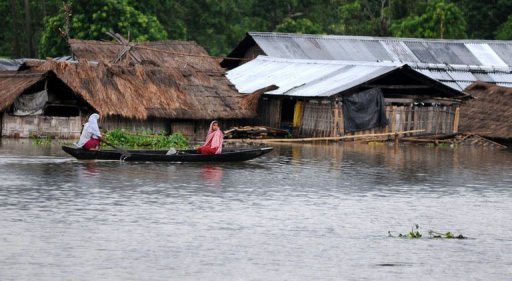 About 2,000 villages had been hit by overflowing waters from the rain-swollen Brahmaputra River AFP, Biju Boro