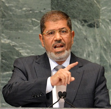 Morsy is willing to enhance the Egyptian/ African relations (file photo) AFP PHOTO / STAN HONDA