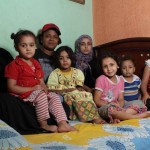 Mervat Abd El-Galil, otherwise known as Kawarshy, with her two sisters-in-law and their children - family she supports from her footballing wage Rachel Adams/ DNE