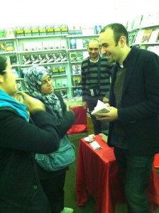 Amr Salama talking to his fans during a signature ceremony of his book "Shab Koshk" (File photo)  Mohamed Bassiouny