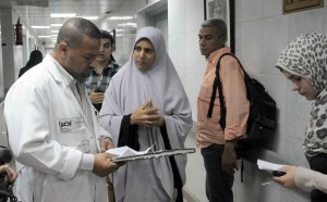 Medical staff speak to patients at a Cairo hospital despite ongoing strike action Mohamed Omar 