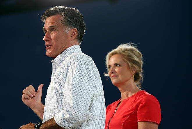 Republican presidential candidate, former Massachusetts Gov. Mitt Romney speaks next to his wife Ann Romney during a campaign rally in Apopka, Florida AFP PHOTO / JUSTIN SULLIVAN
