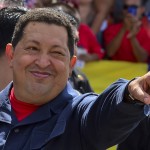 Venezuelan President Hugo Chavez gestures before voting in Caracas AFP PHOTO / LUIS ACOSTA