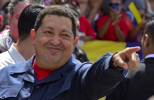 Venezuelan President Hugo Chavez gestures before voting in Caracas  AFP PHOTO / LUIS ACOSTA